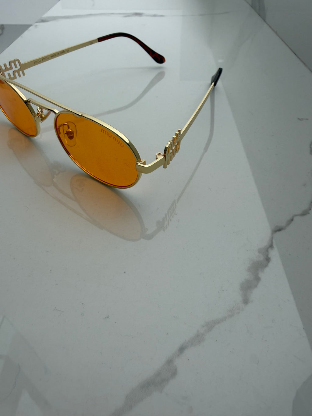 Lentes Miu Miu