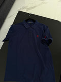 Camisa polo azul marino