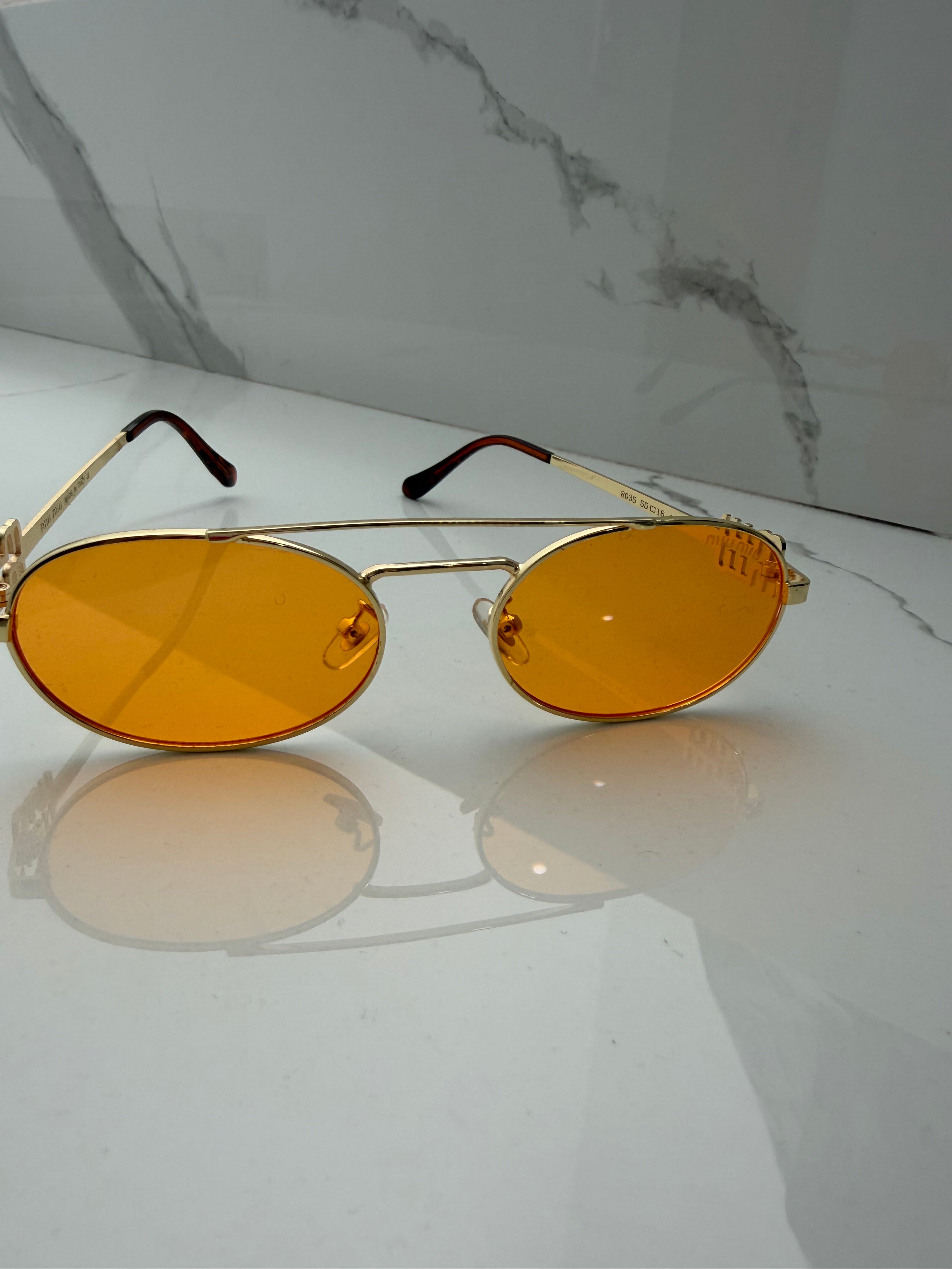 Lentes Miu Miu