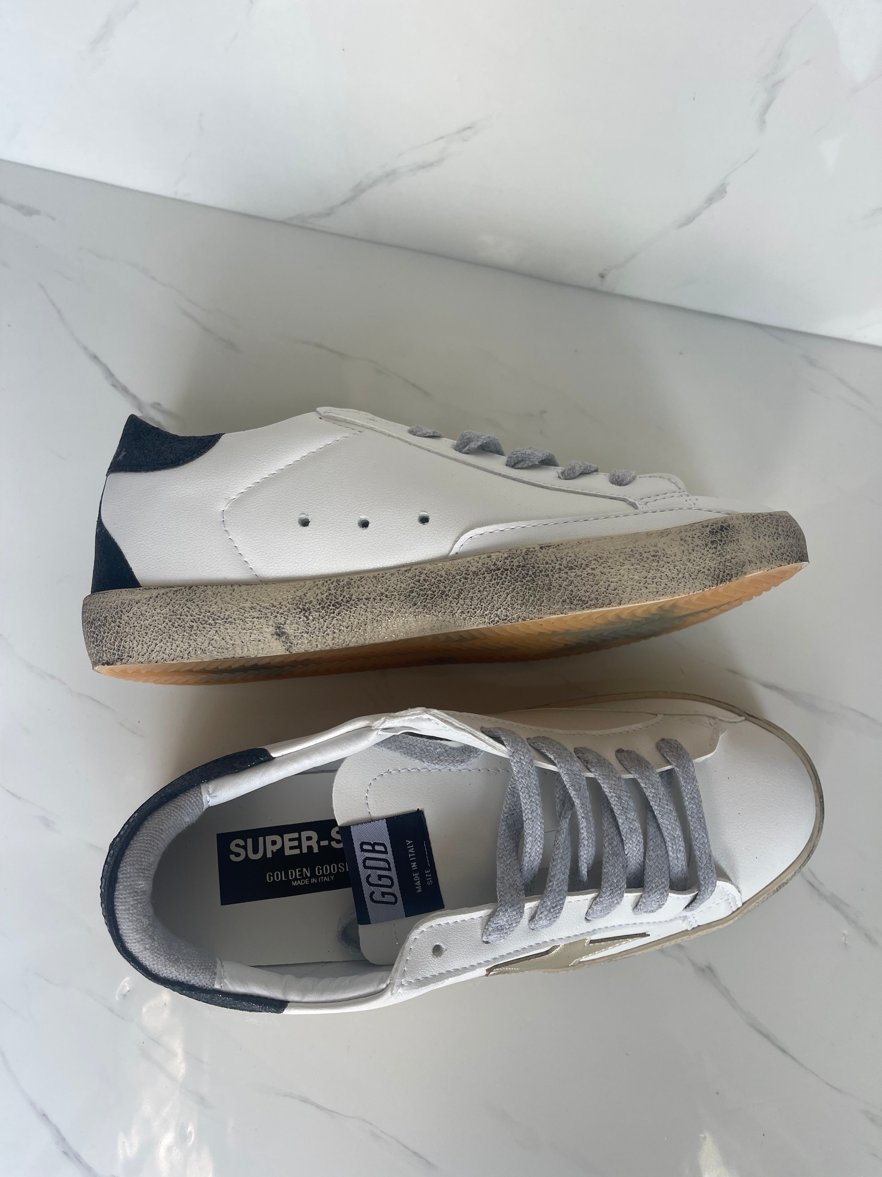 Golden goose estrella dorado talón negro