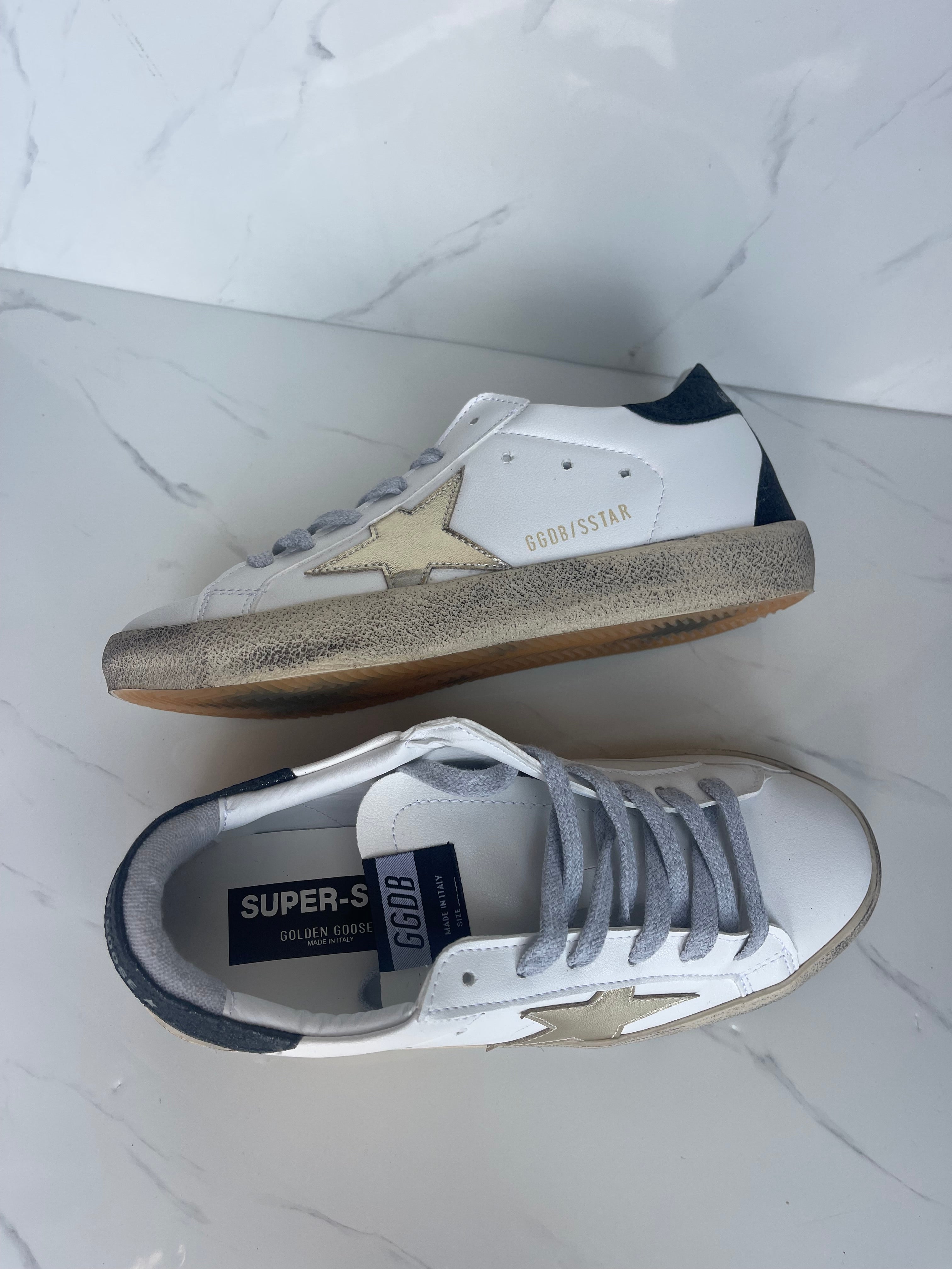 Golden goose estrella dorado talón negro
