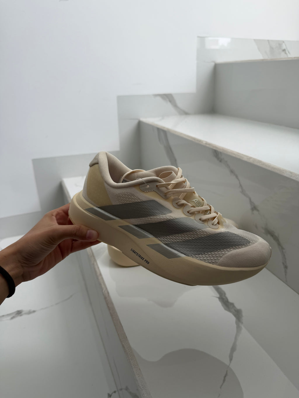 Adizero crema