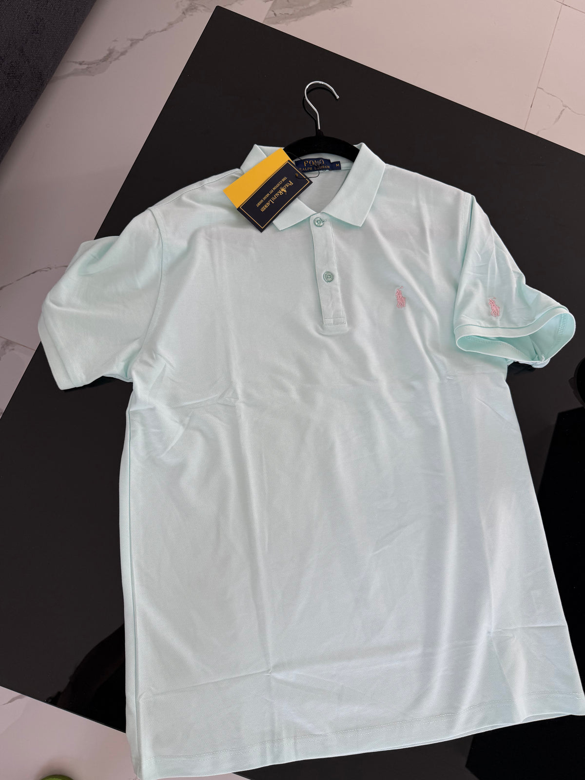 Camisa polo azul apcielo