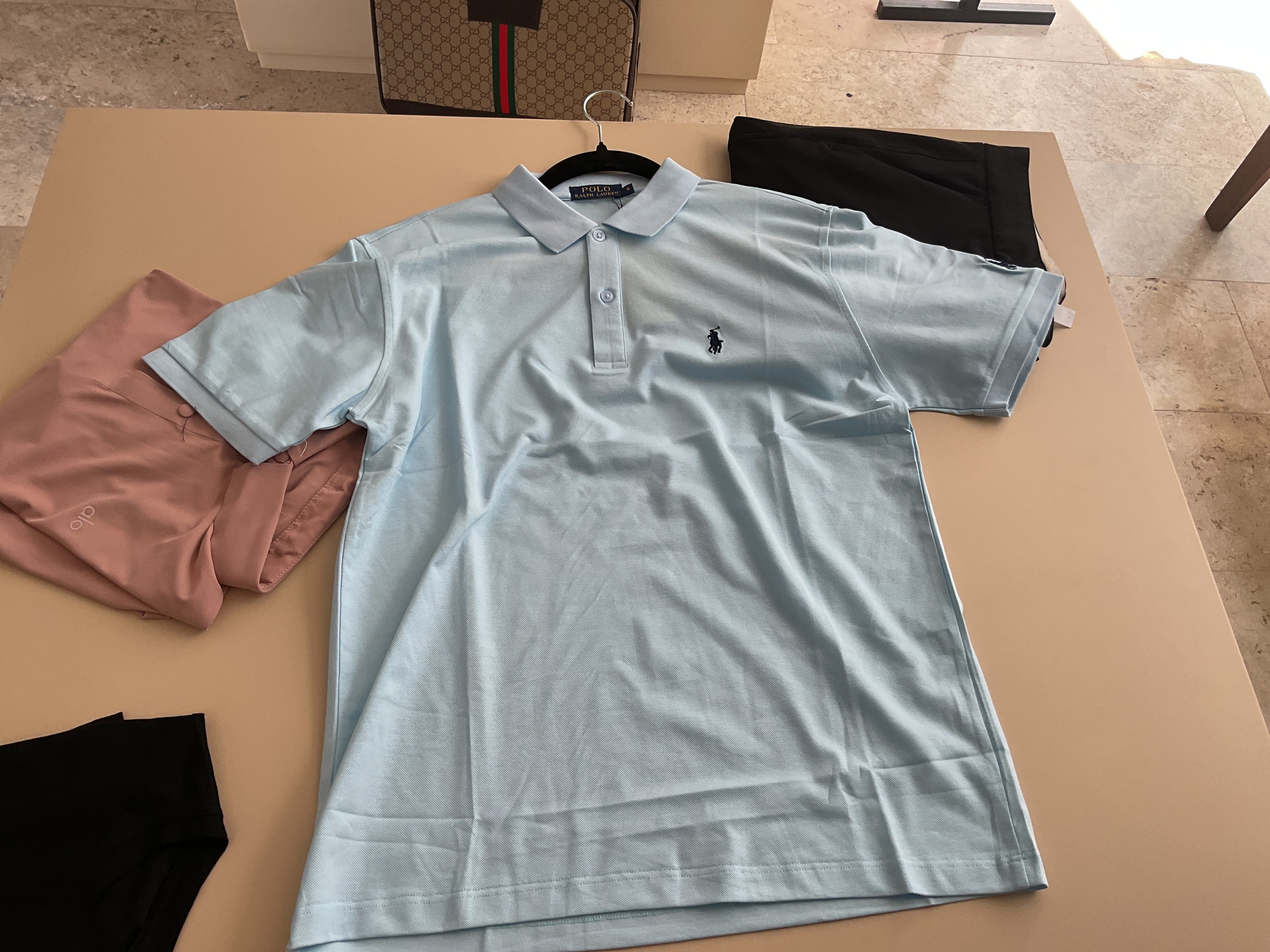 Playera polo azul celeste