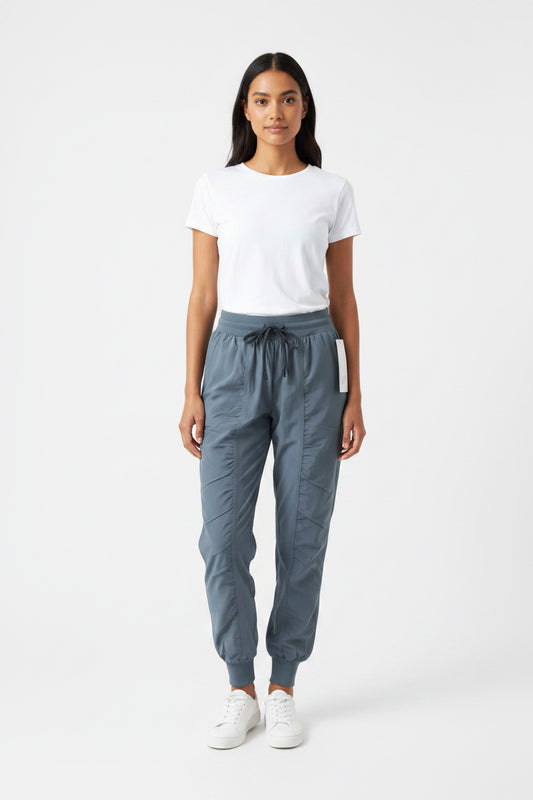 Jogger Alo yoga rompe vientos Gris