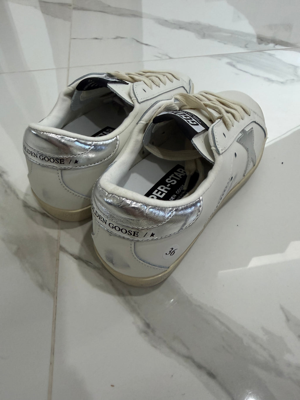 Golden Goose estrella plateada talón