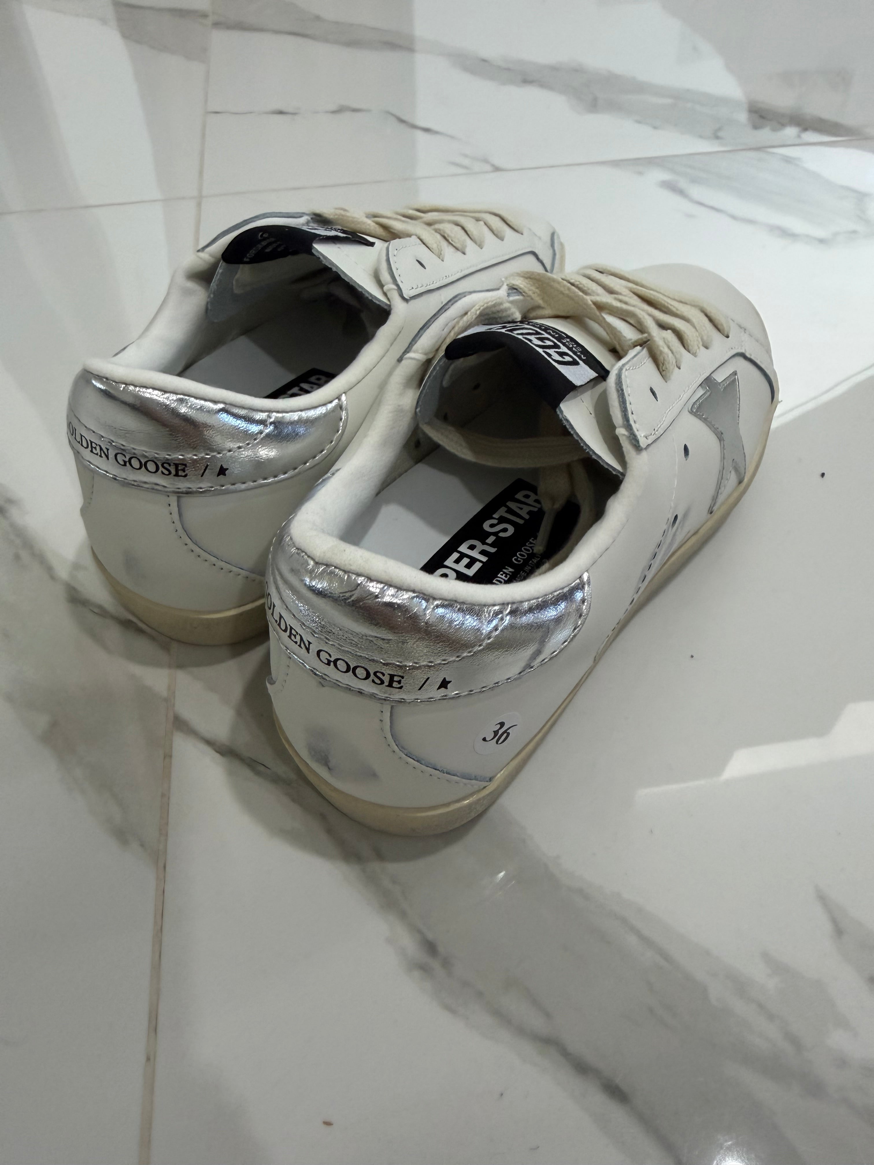 Golden Goose estrella plateada talón