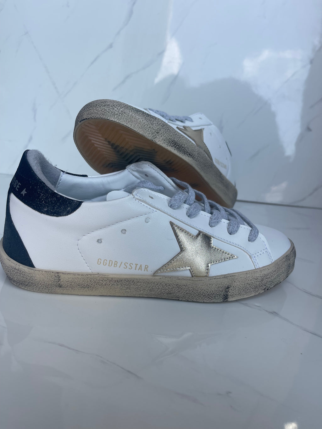 Golden goose estrella dorado talón negro