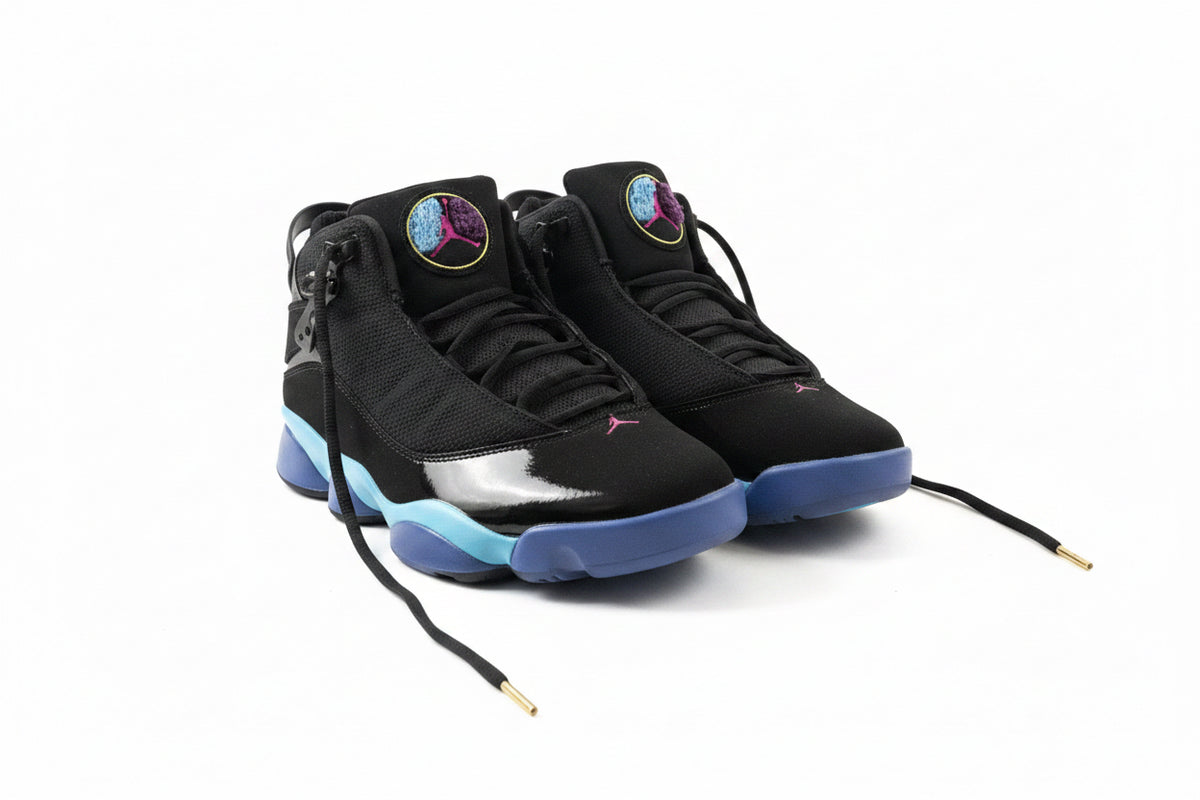 Jordan negro suela azul