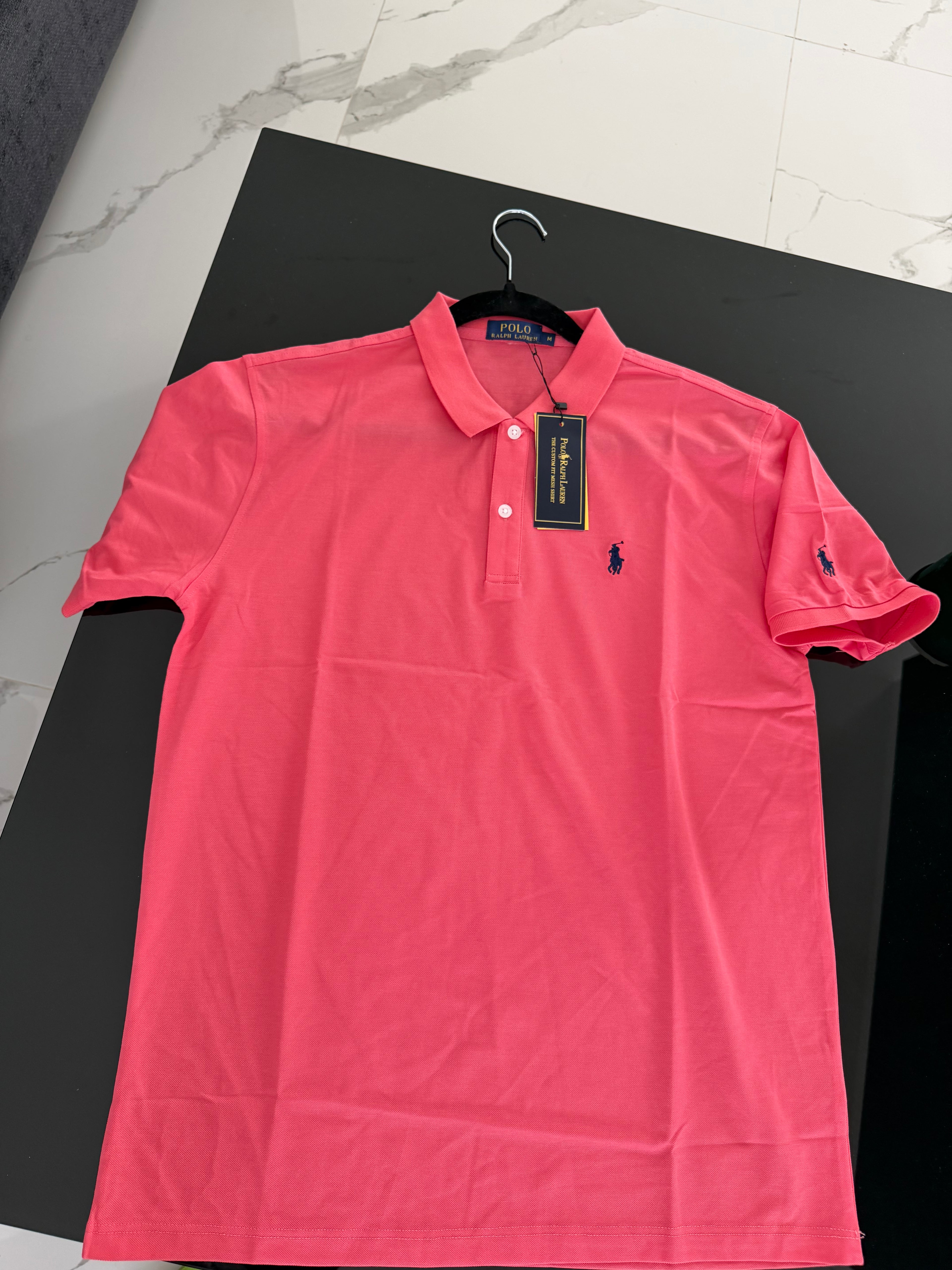 Playera polo rosa