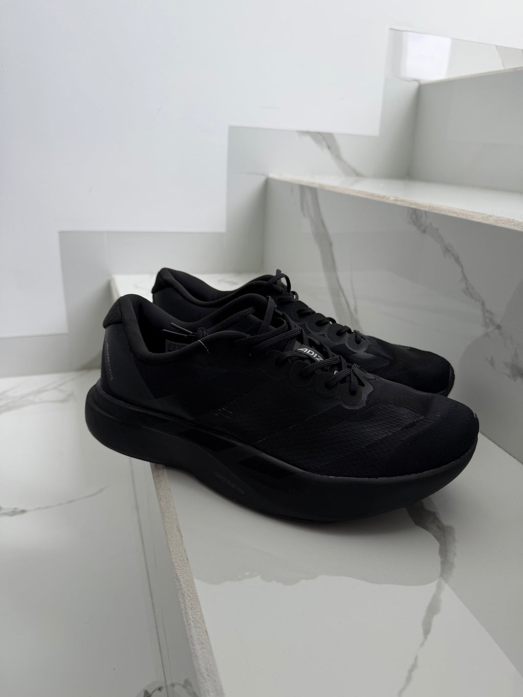 Adizero  negro
