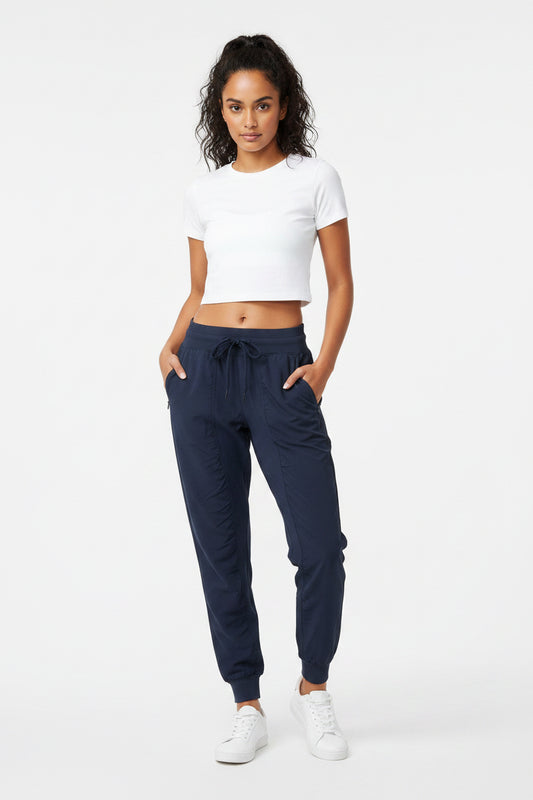 Jogger alo yoga rompe vientos azul marino