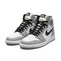 Bota Nike gris blanco