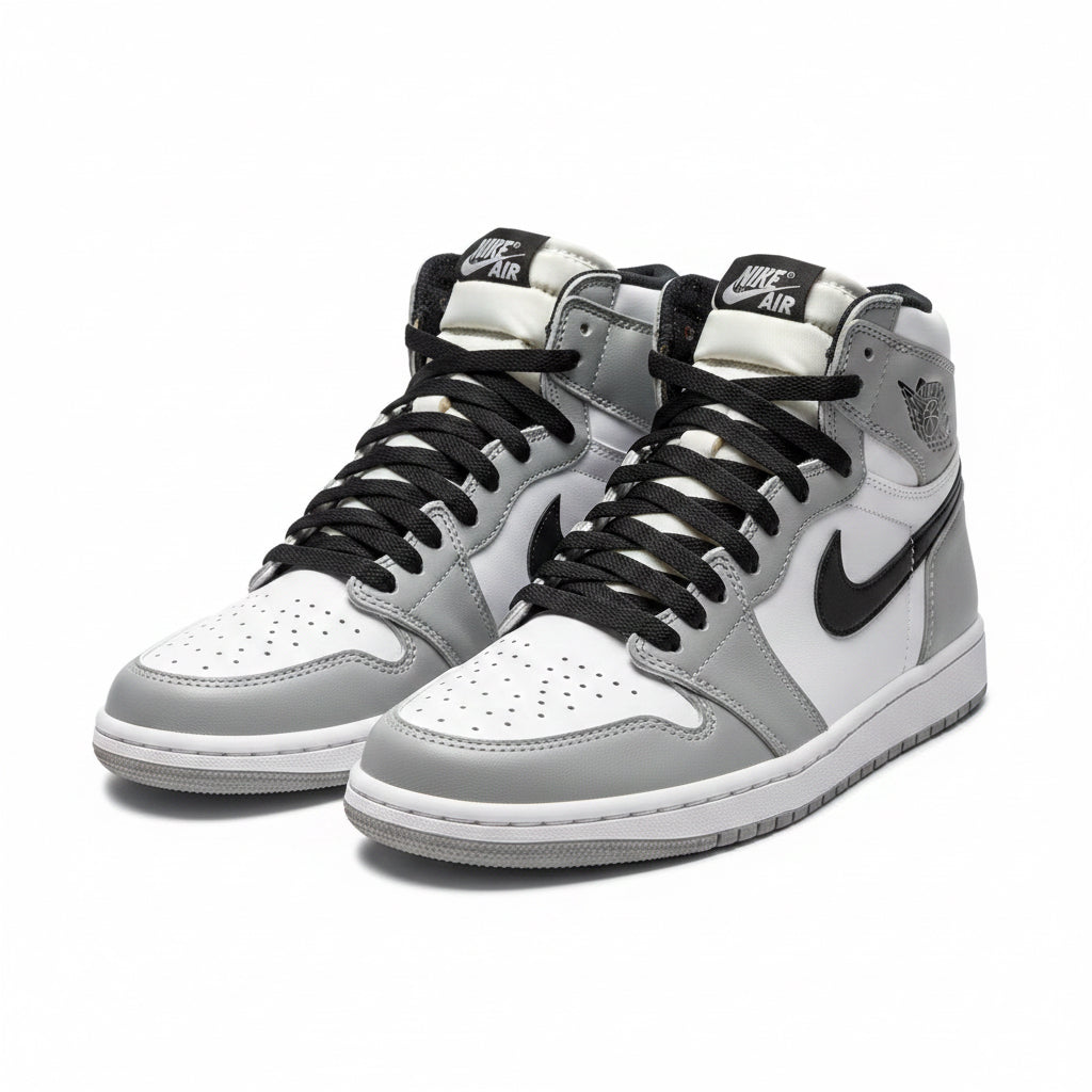 Bota Nike gris blanco