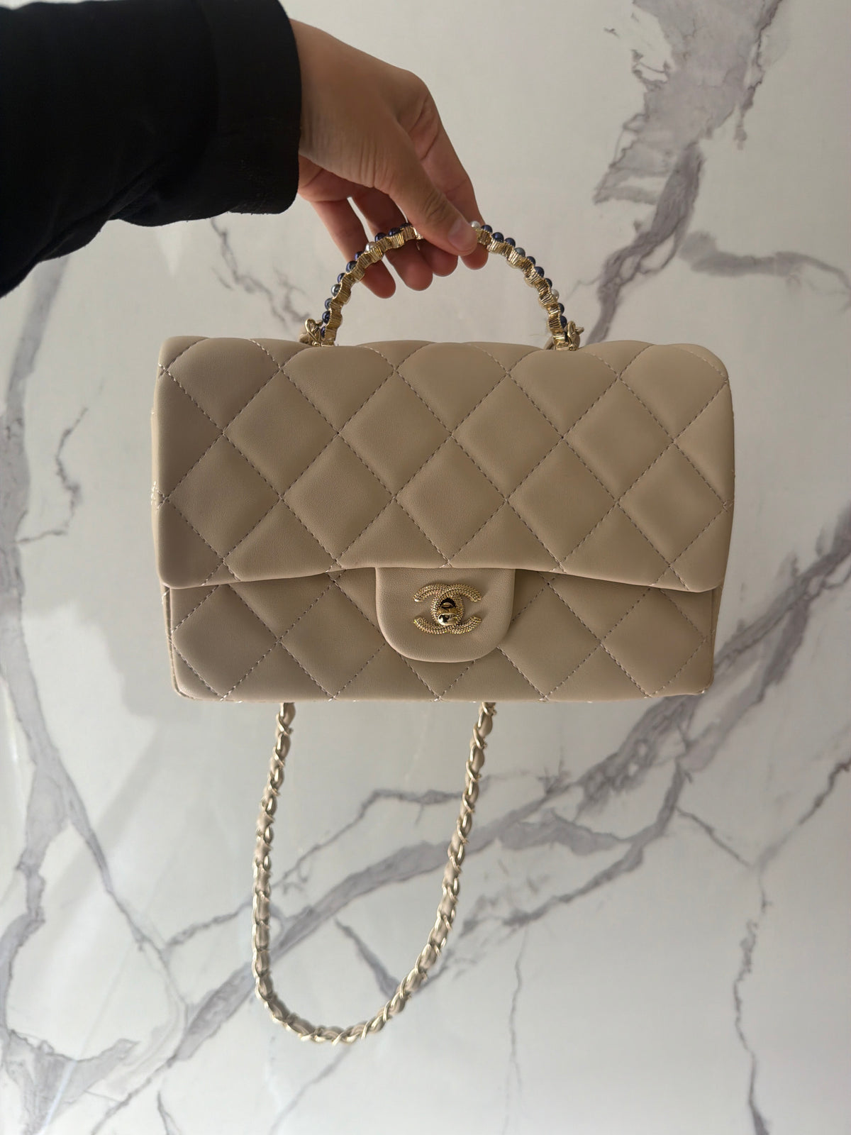 Bolsa Chanel beige