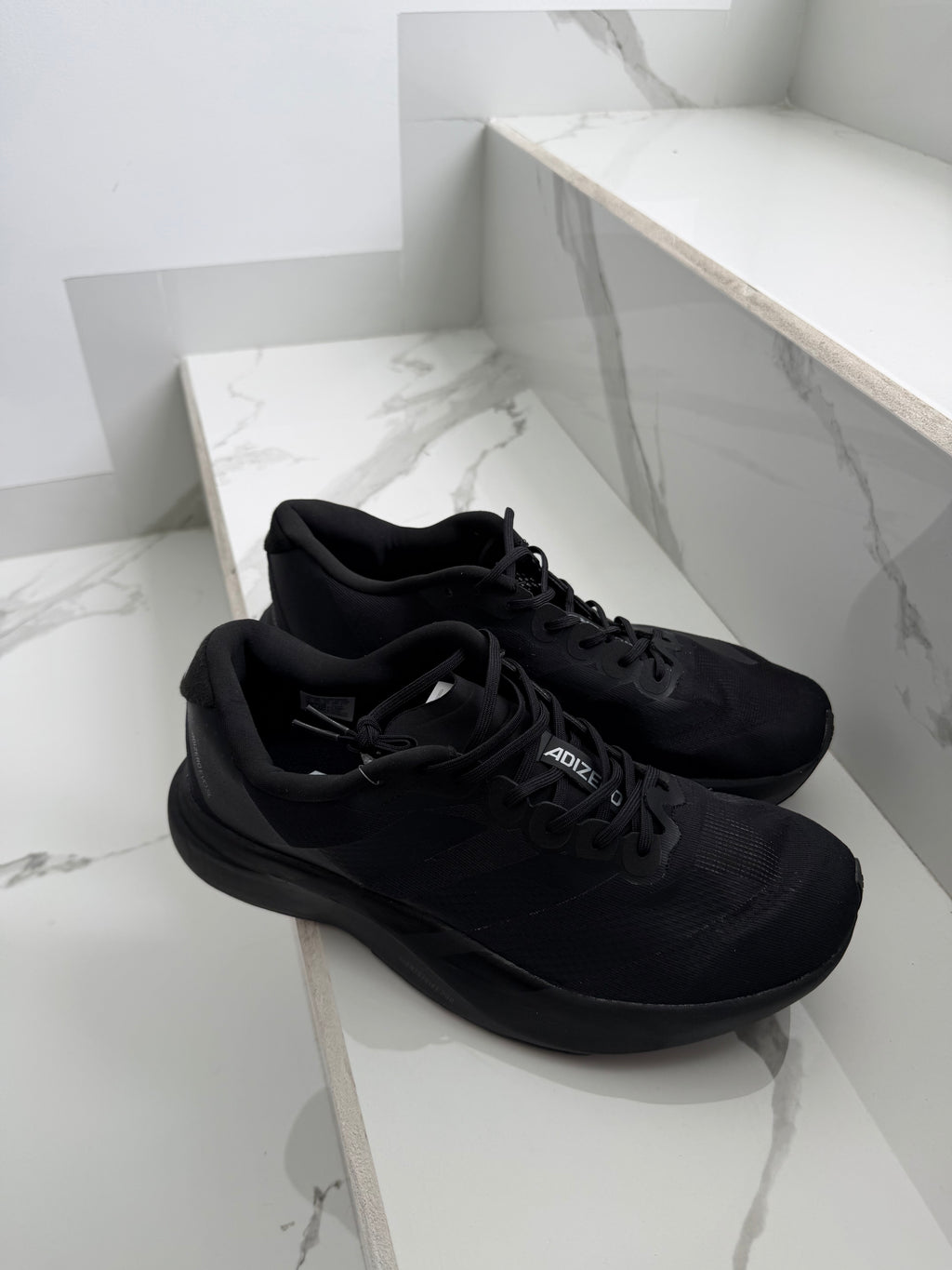 Adizero  negro