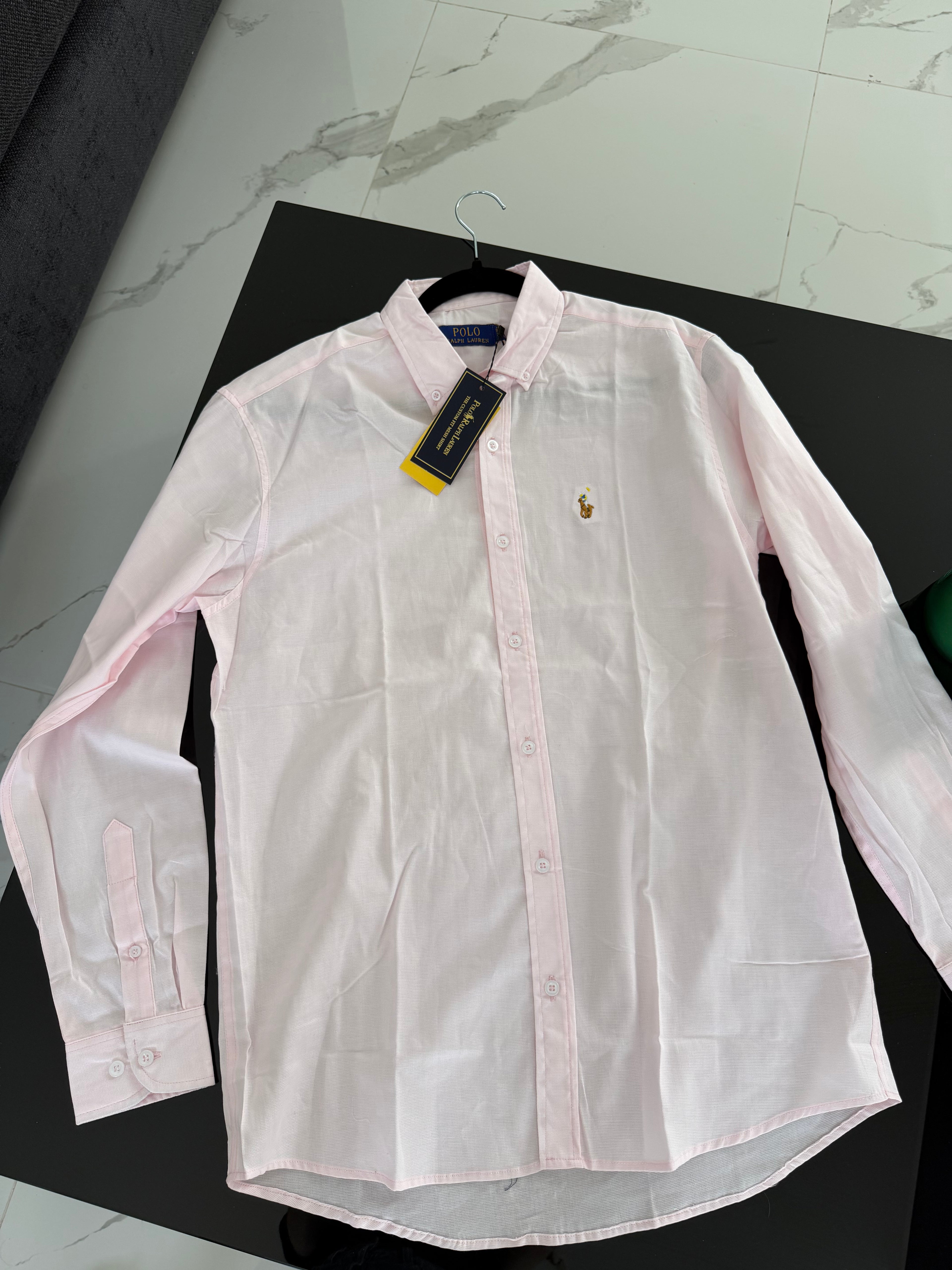 Camisa polo rosa