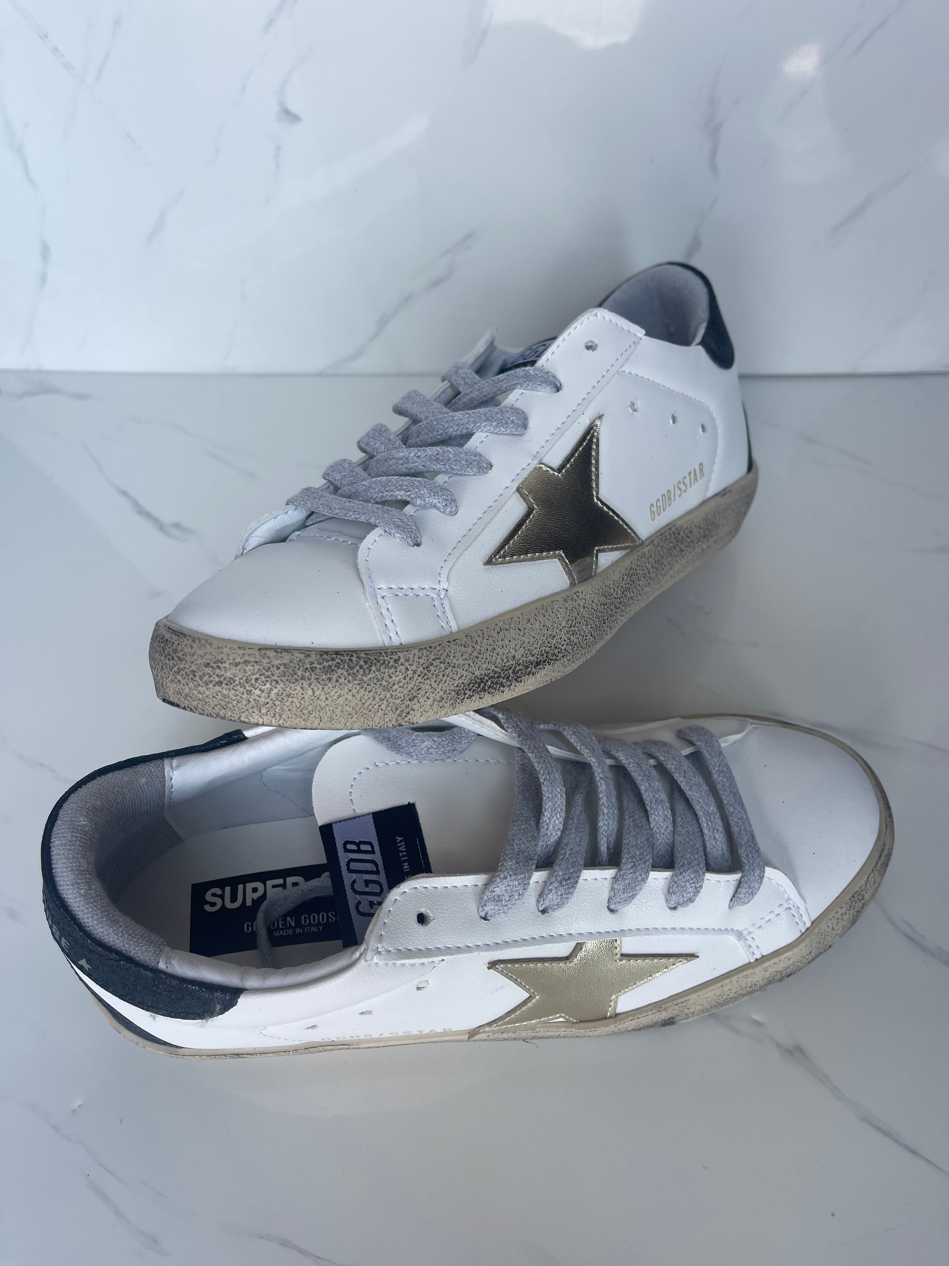 Golden goose estrella dorado talón negro