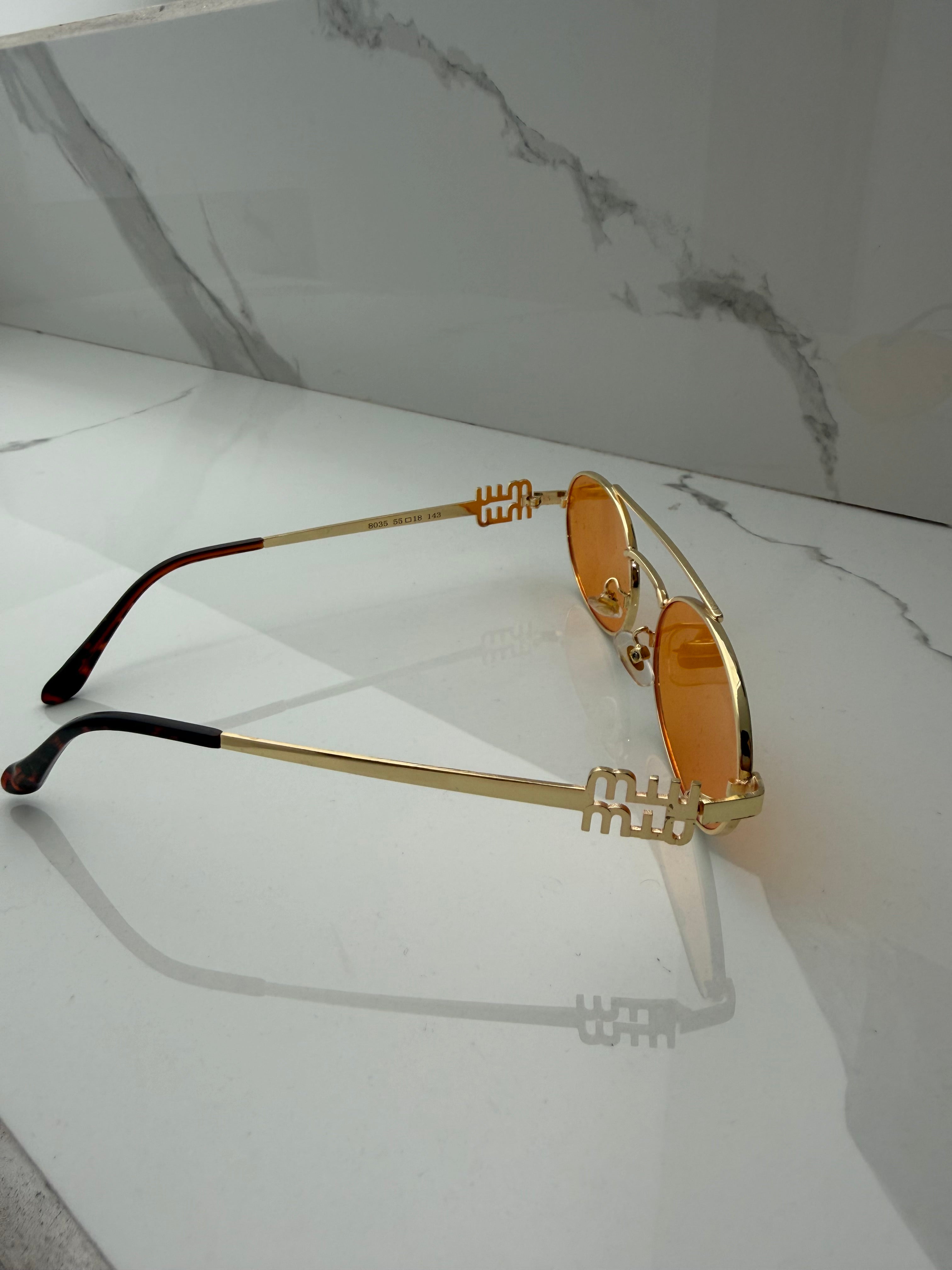 Lentes Miu Miu