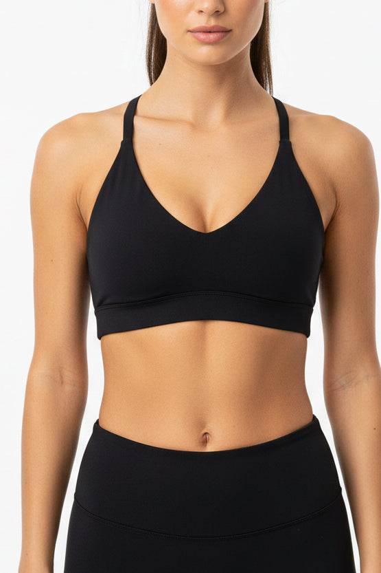 Top Alo yoga negro cruzado