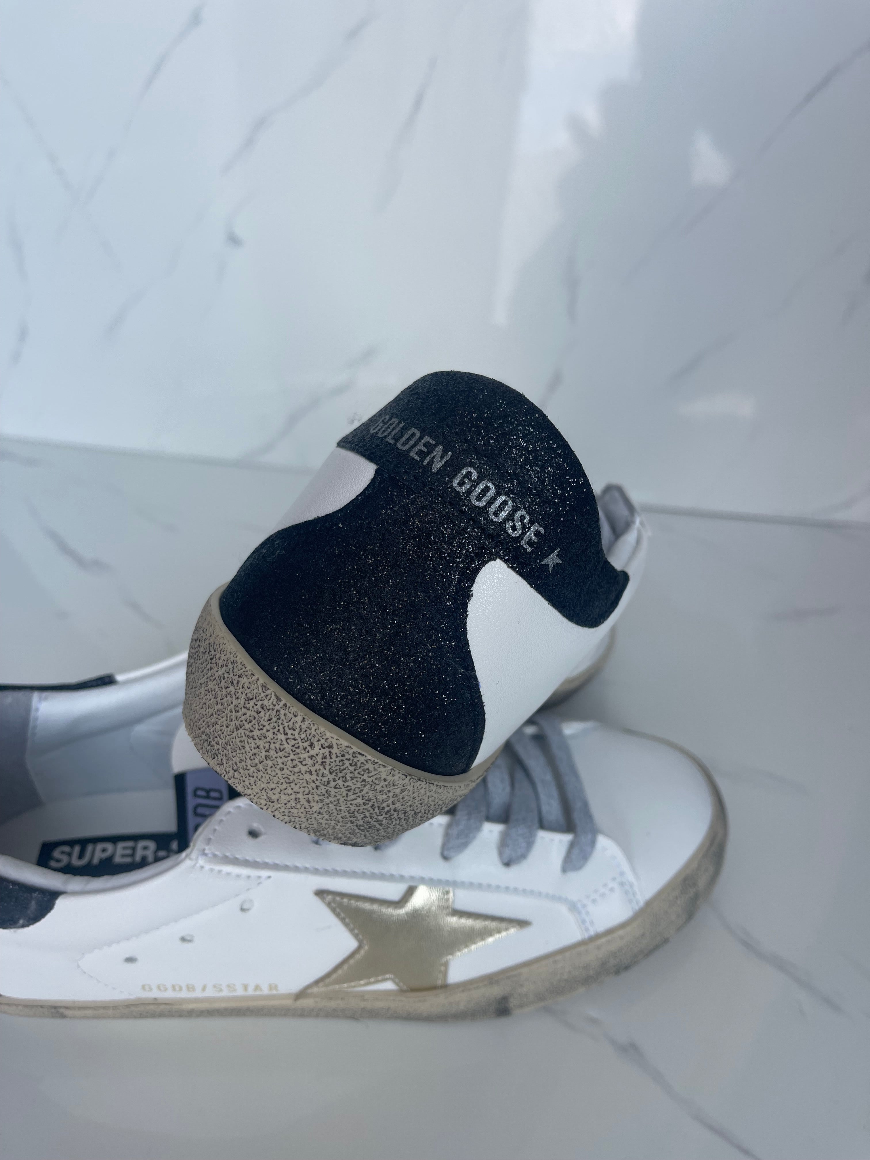Golden goose estrella dorado talón negro