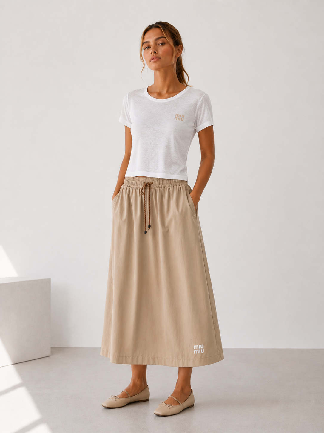Conjunto Miu Miu falda y playera