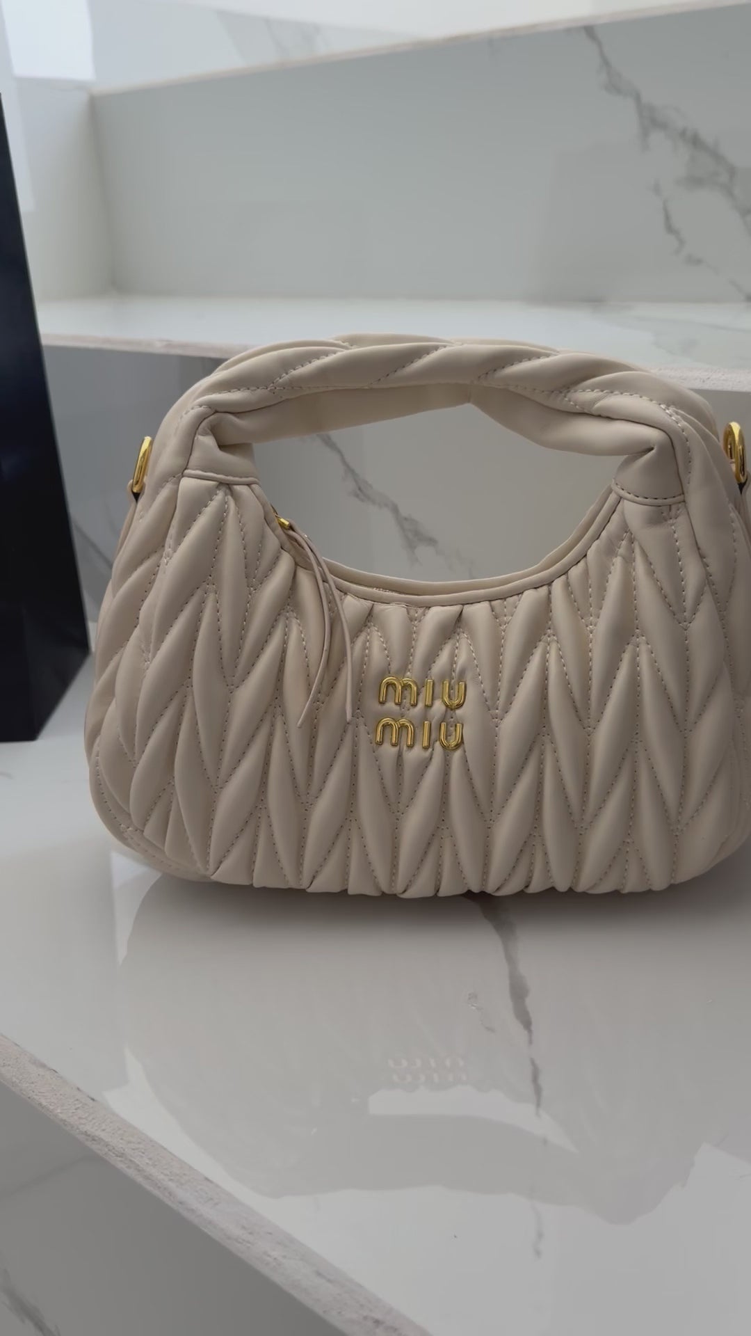 Bolsa Miu Miu hueso
